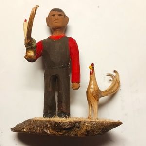 Hand carved folk art farmer and rooster